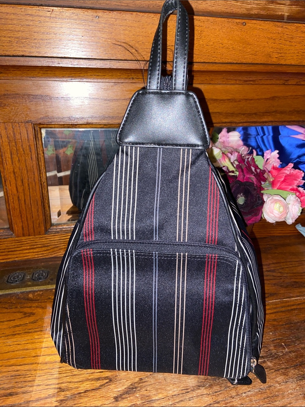 villager Black Sling Mini Backpack with White and Red Pinstripes